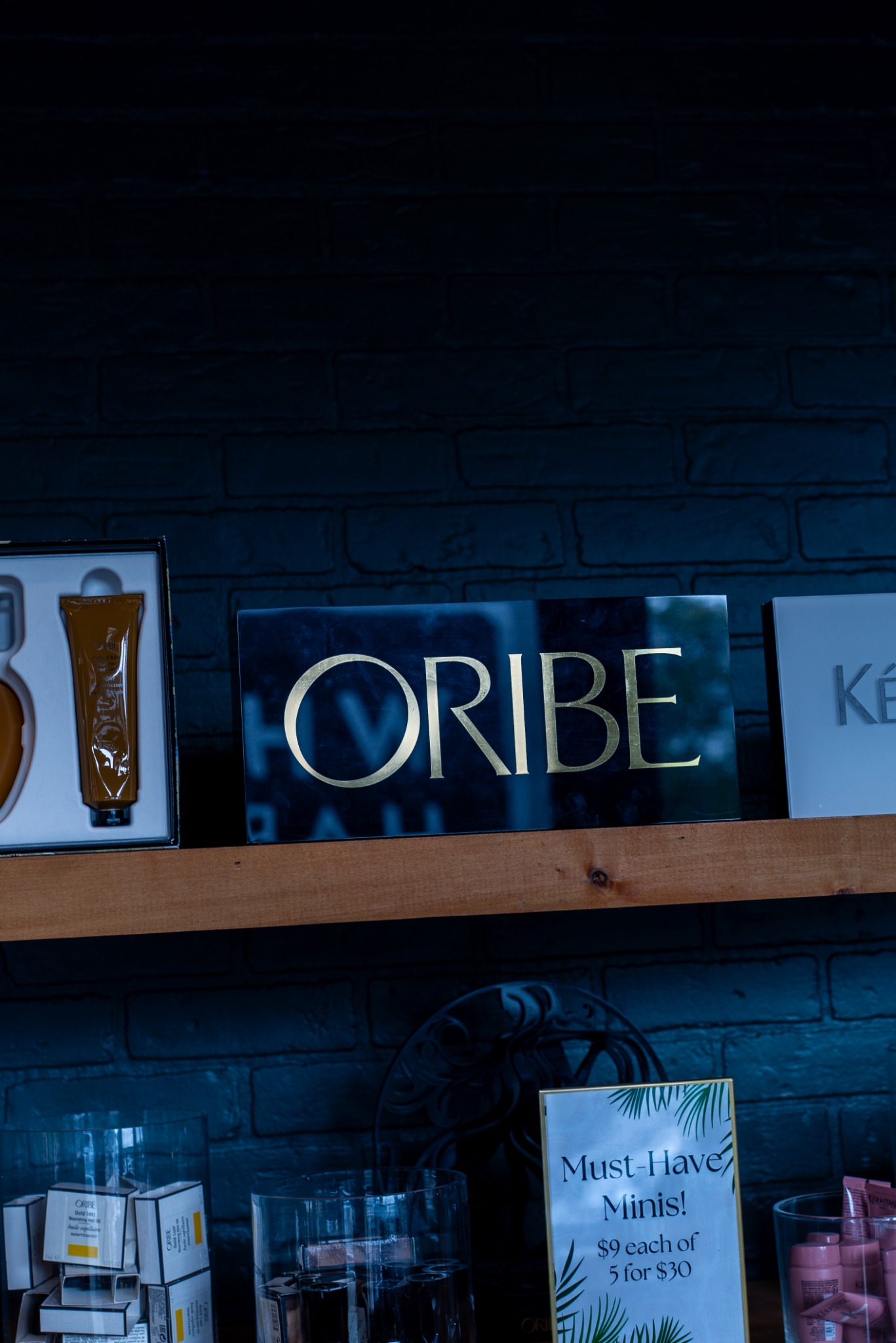 Premium Oribe product display and salon retail merchandising